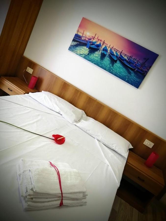 Camera Matrimoniale/Doppia con Letti Singoli con Letto Supplementare