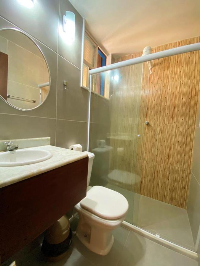 Quarto Triplo com Vista Lateral do Mar
