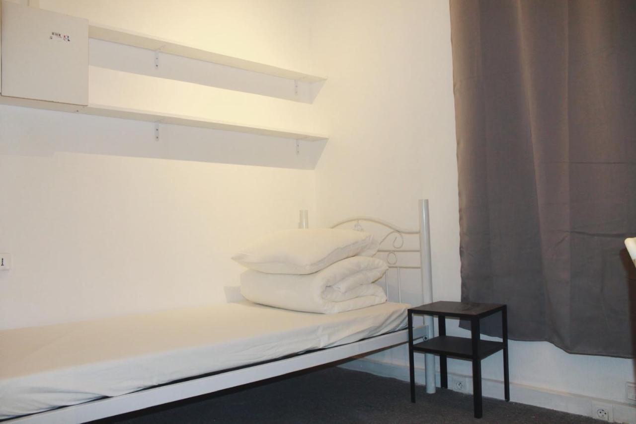 Habitación individual con aseo compartido