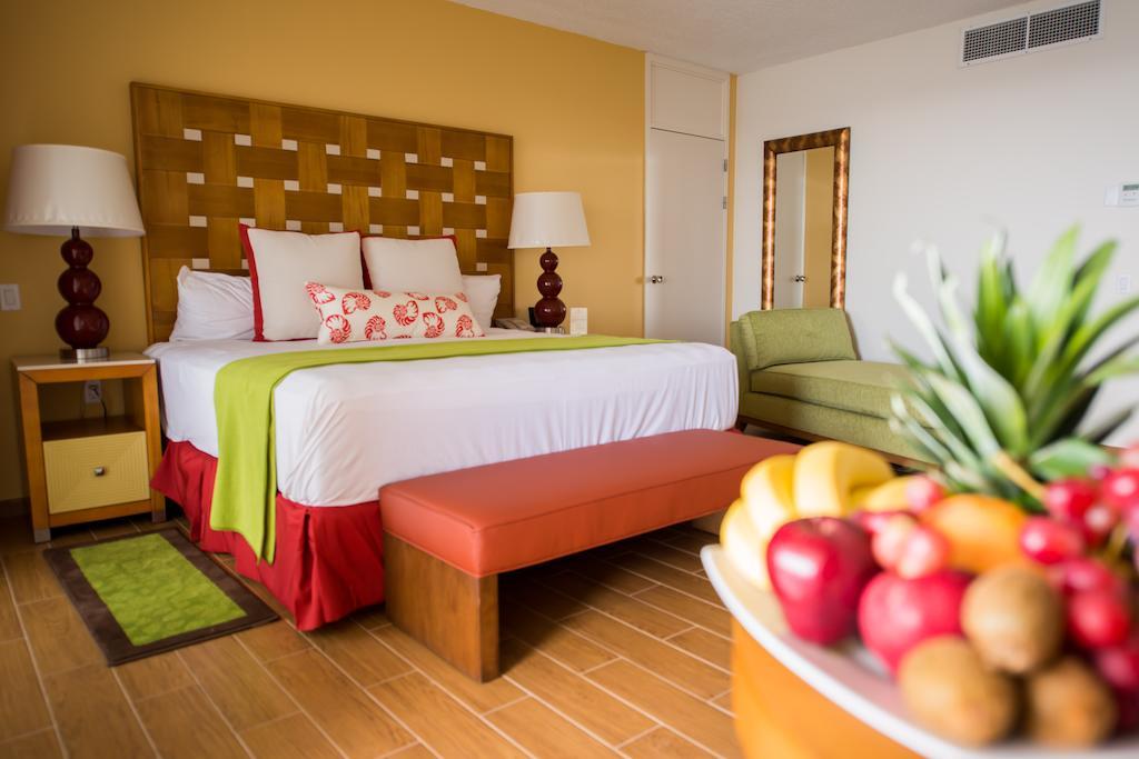 Quarto Sun VIP Deluxe com Cama King-size e Vista do Mar