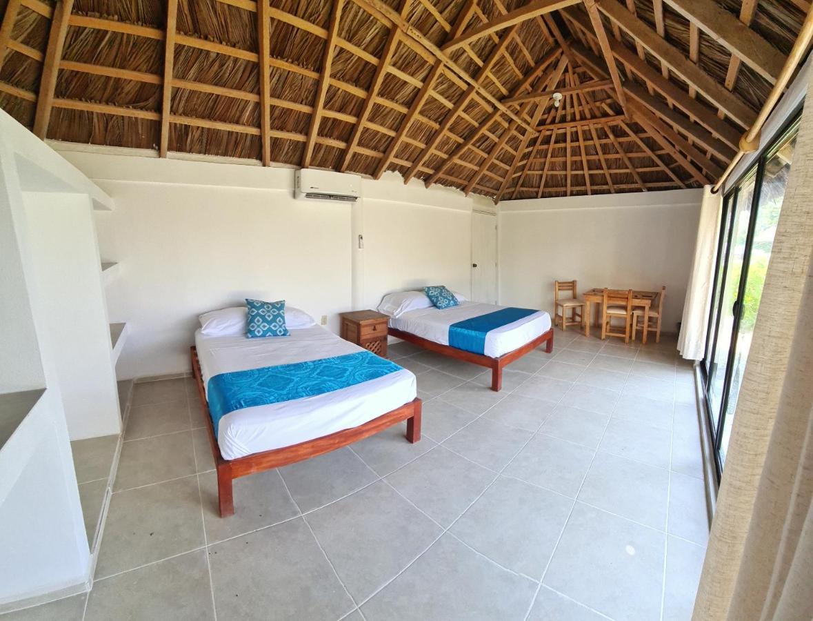 Habitación Cuádruple - vistas al jardín