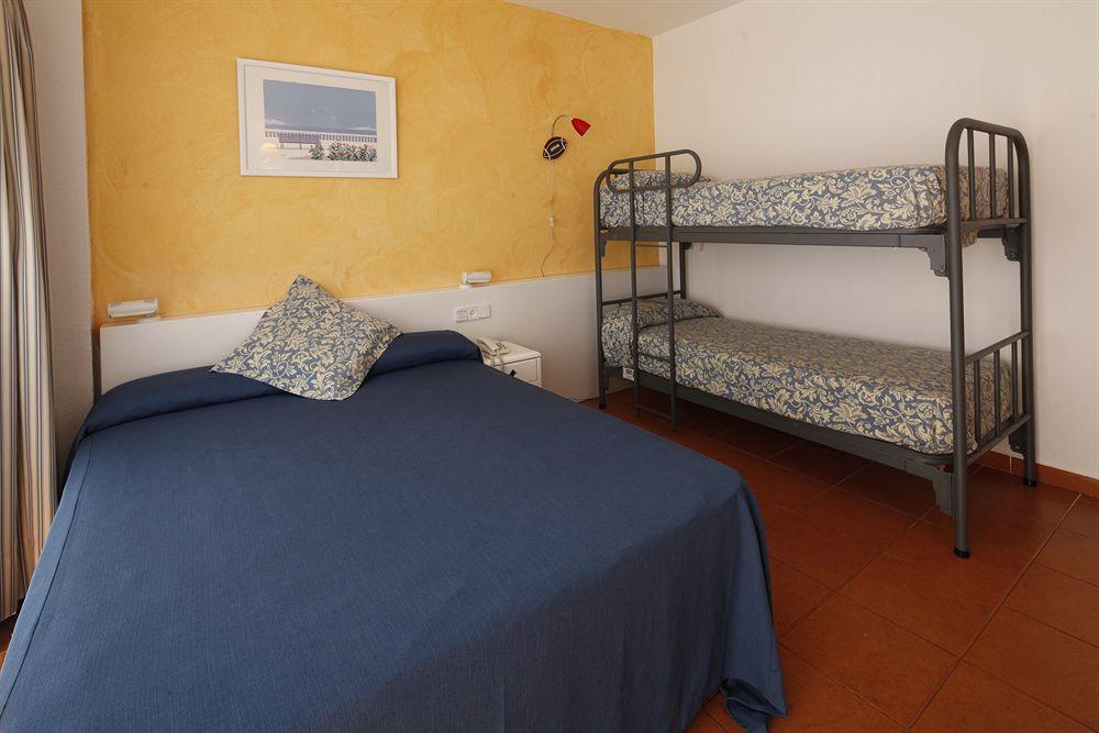 Habitación Cuádruple (2 adultos + 2 niños)