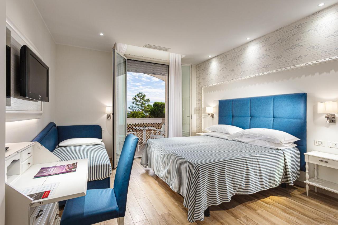 Dreibettzimmer mit Meerblick