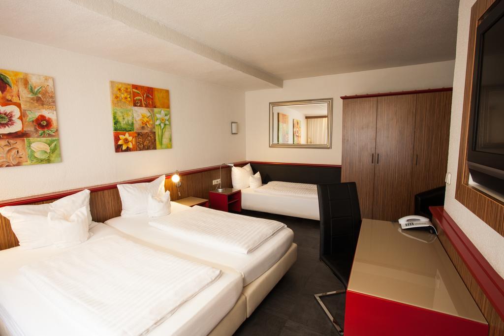 Dreibettzimmer