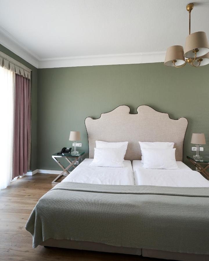 Deluxe Tweepersoonskamer met 1 of 2 Bedden - Inclusief Minibar met Gratis Drankjes