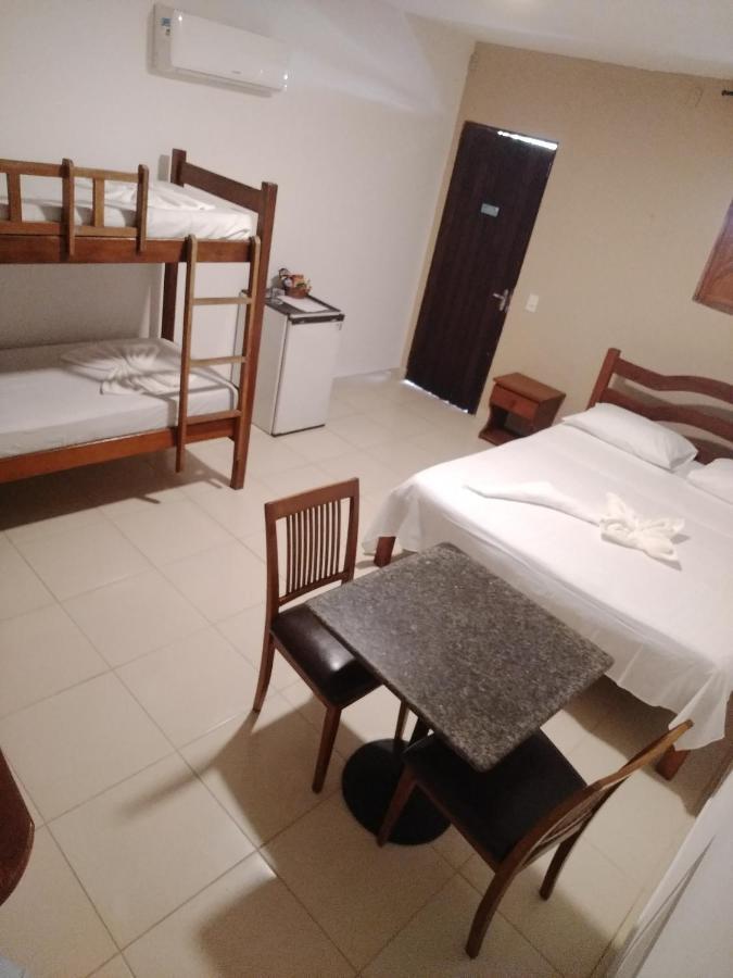 Quarto Quádruplo com Vista Jardim