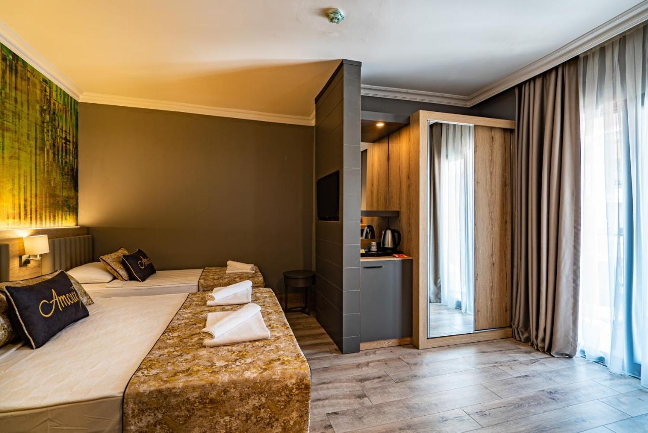Dreibettzimmer mit Balkon