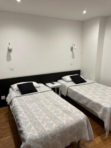 Zweibettzimmer mit eigenem Bad