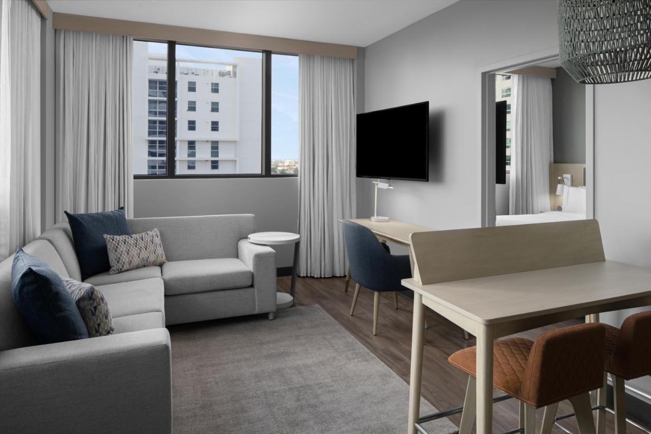 One-Bedroom Larger King Suite with Sofa Bed and City View - Mobility and Hearing Accessible with Roll-in Shower