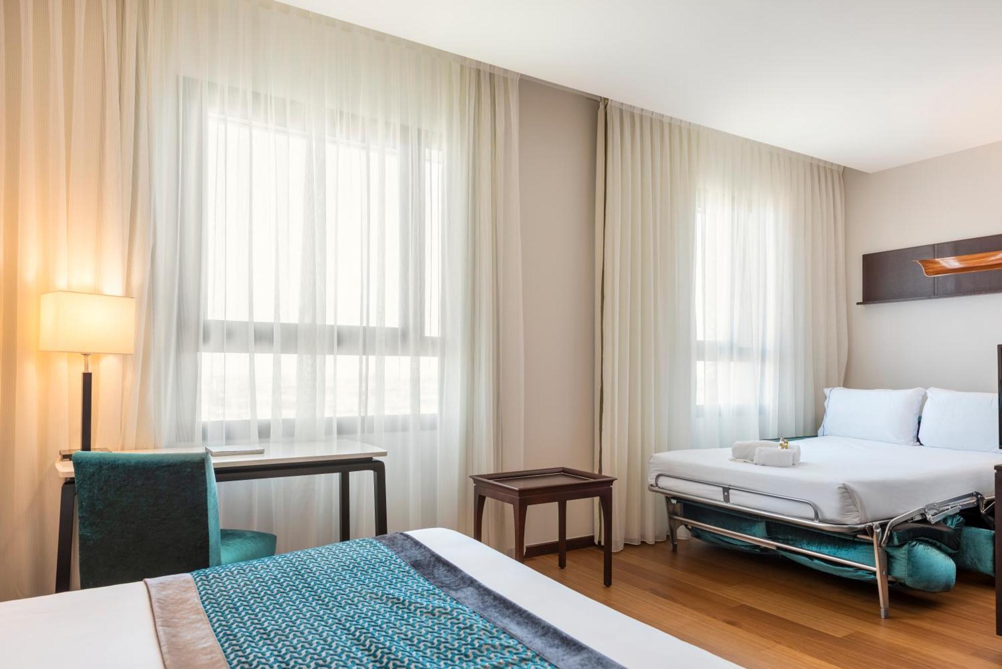 Quarto Duplo com Sofá-cama