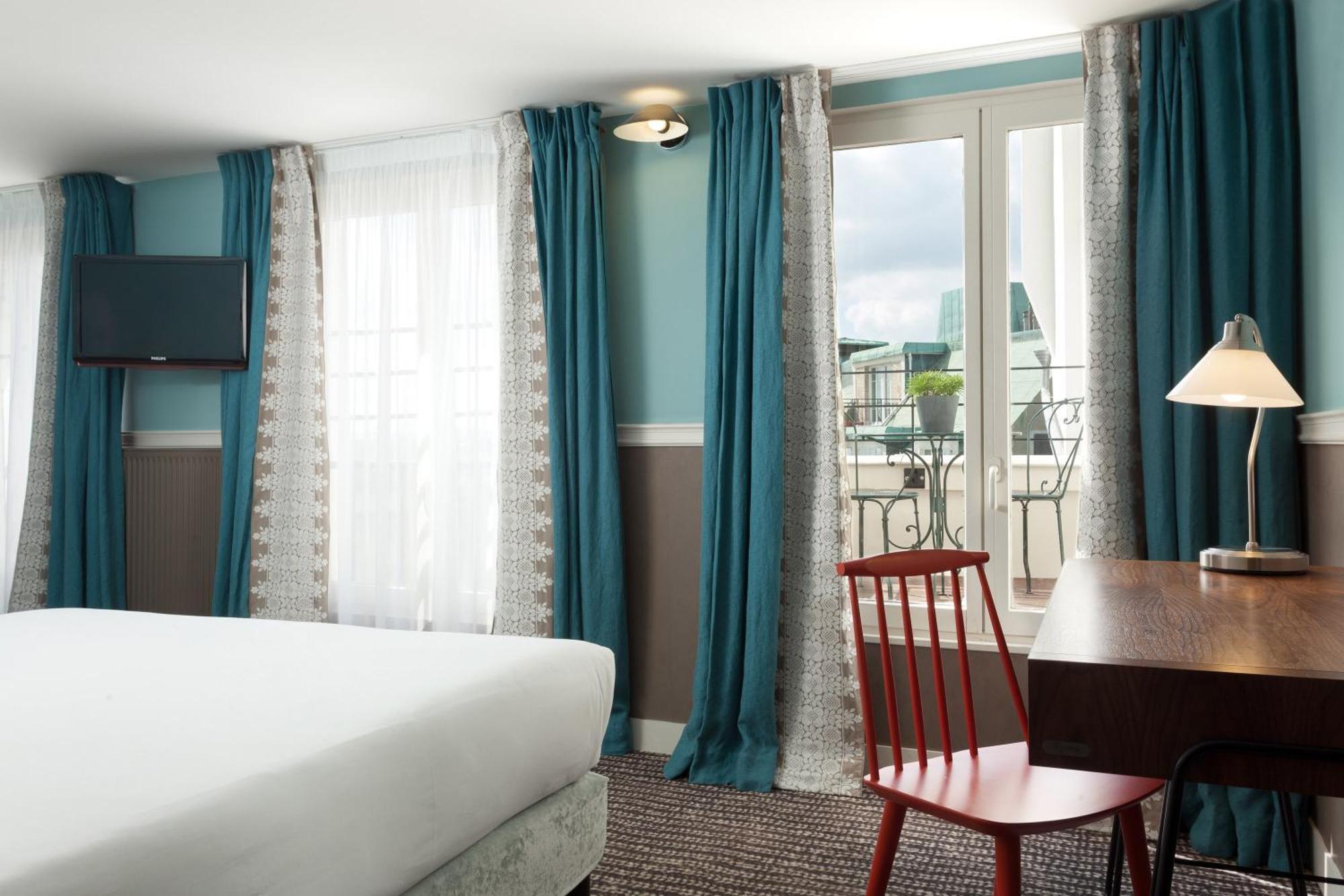 Chambre Deluxe avec Balcon - Vue sur Toit