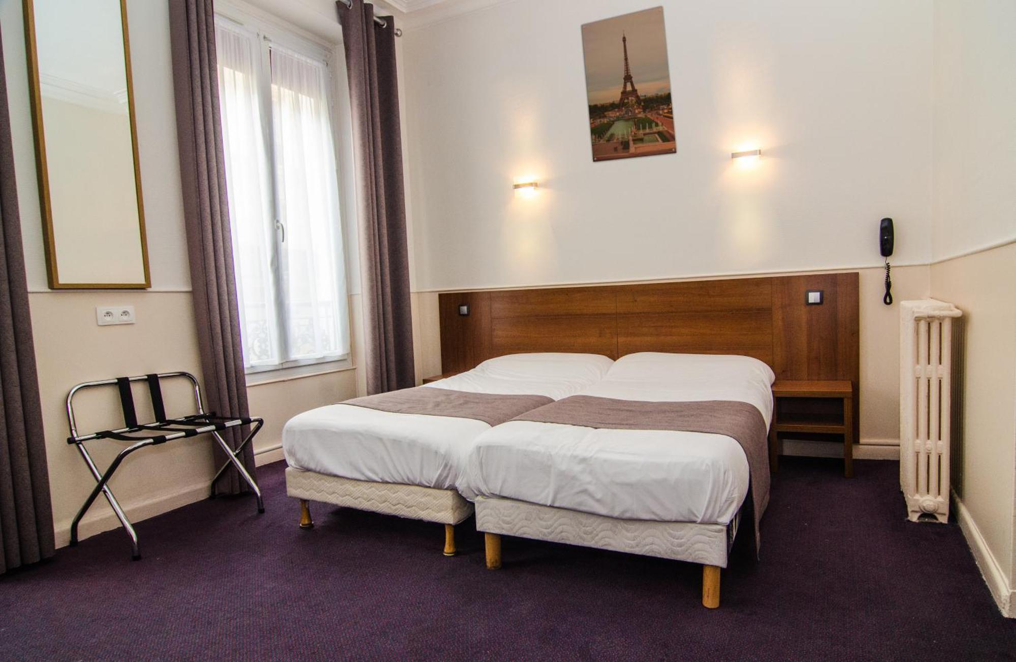 Quarto com 2 Camas de Solteiro
