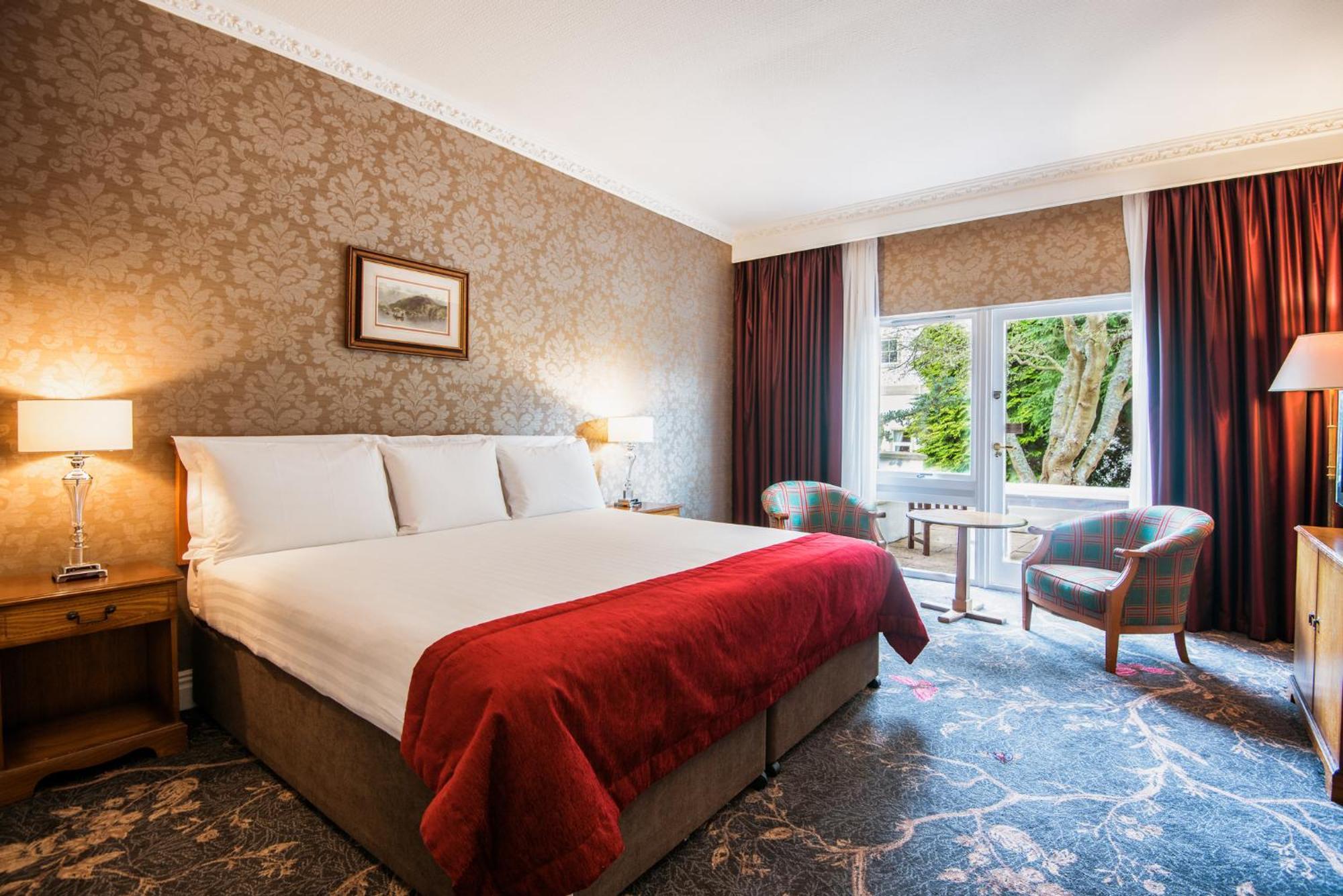 Classic Kamer met Kingsize Bed en Patio - Uitzicht op de Tuin