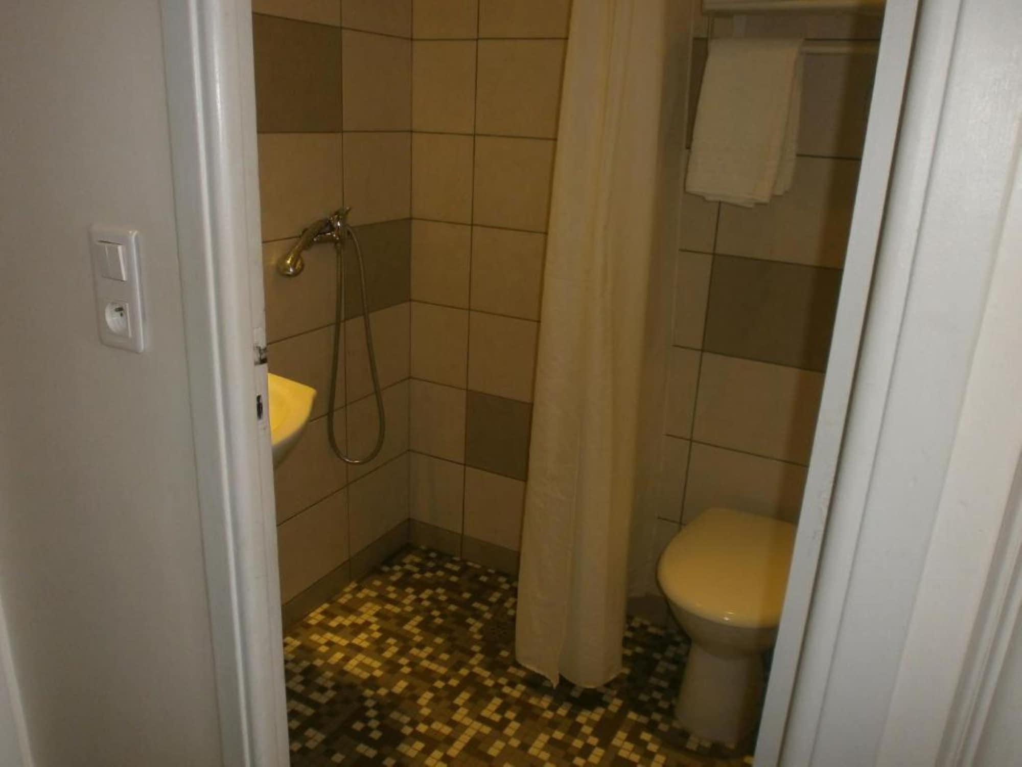 Tweepersoonskamer met 2 Aparte Bedden en Balkon - Uitzicht op Zee