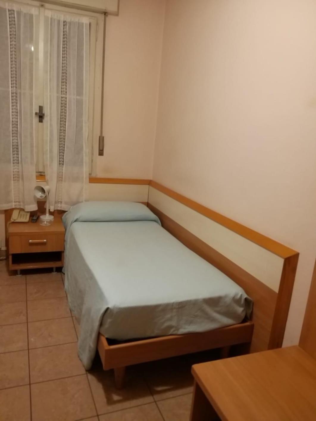 Camera Singola con Bagno in Comune