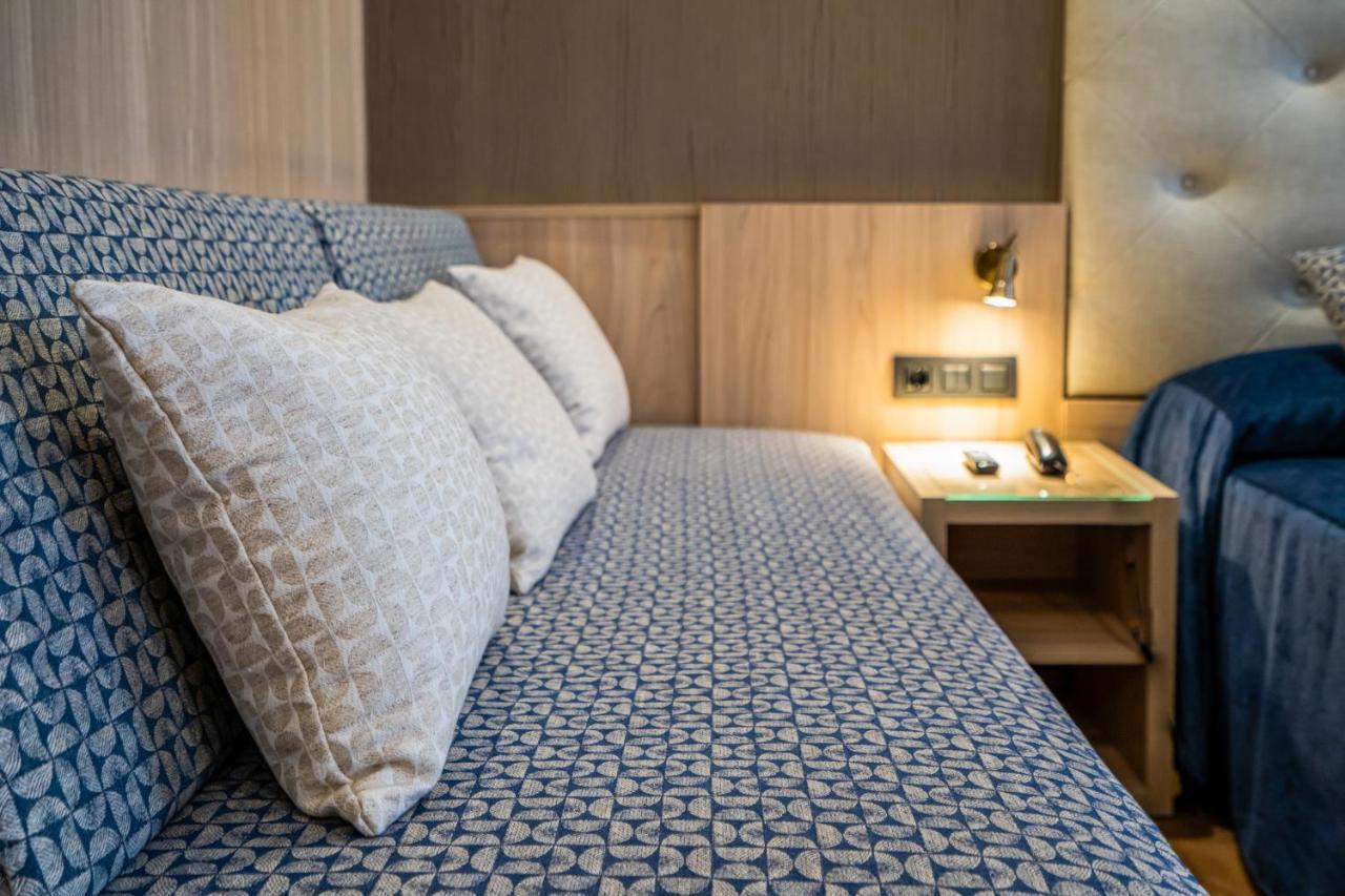 Tweepersoonskamer met 1 of 2 Bedden en een Extra Bed