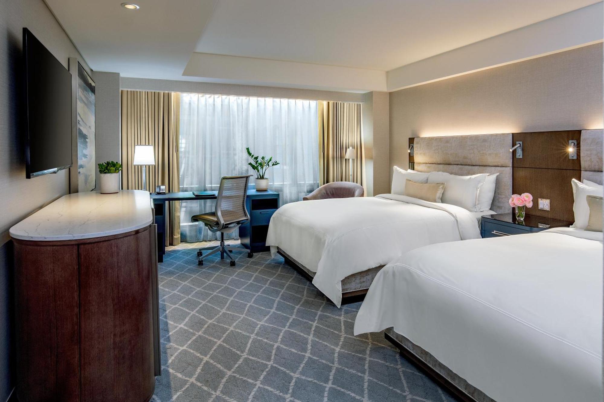 Suite met 1 Slaapkamer en 2 Queensize Bedden