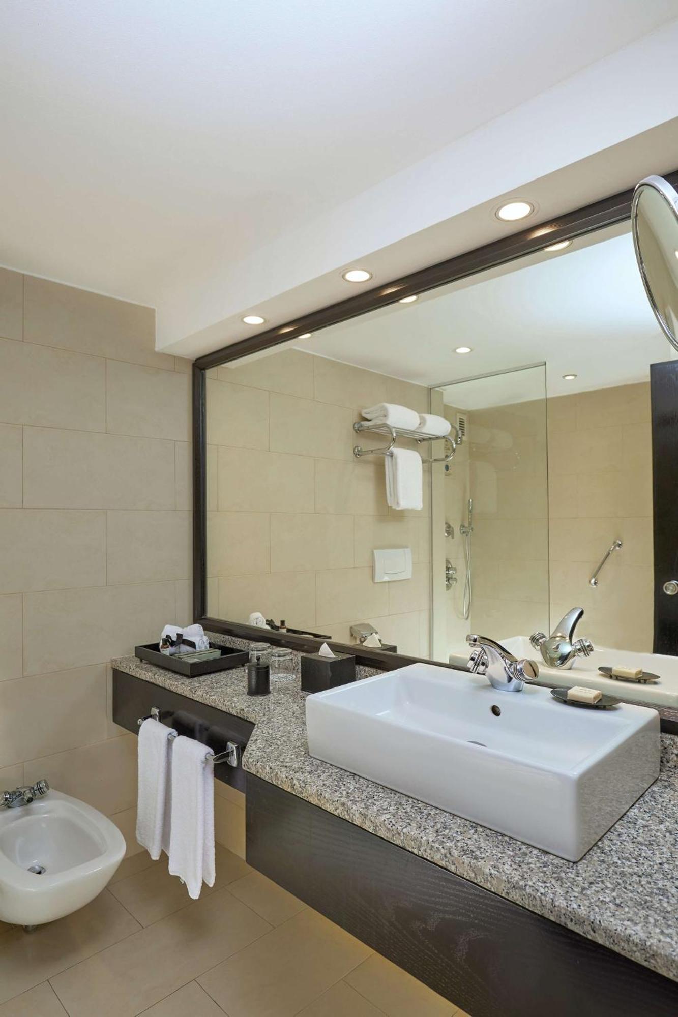 Chambre Lits Jumeaux Exécutive - Vue sur Piscine