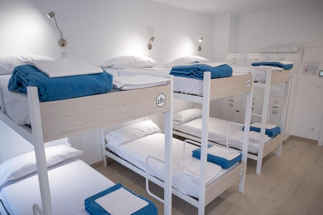 Cama en habitación compartida mixta de 6 camas