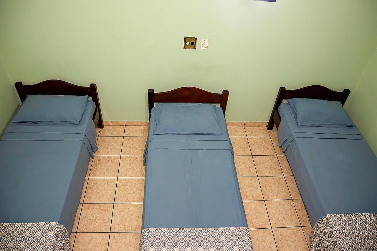 Quarto Triplo com ventilador de teto