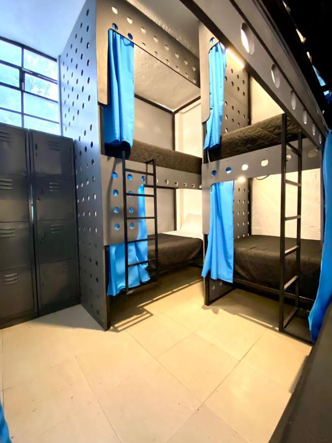 Cama en habitación compartida de 6 camas