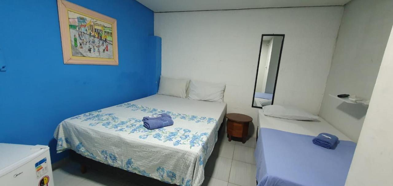 Quarto Triplo Básico com Banheiro Compartilhado