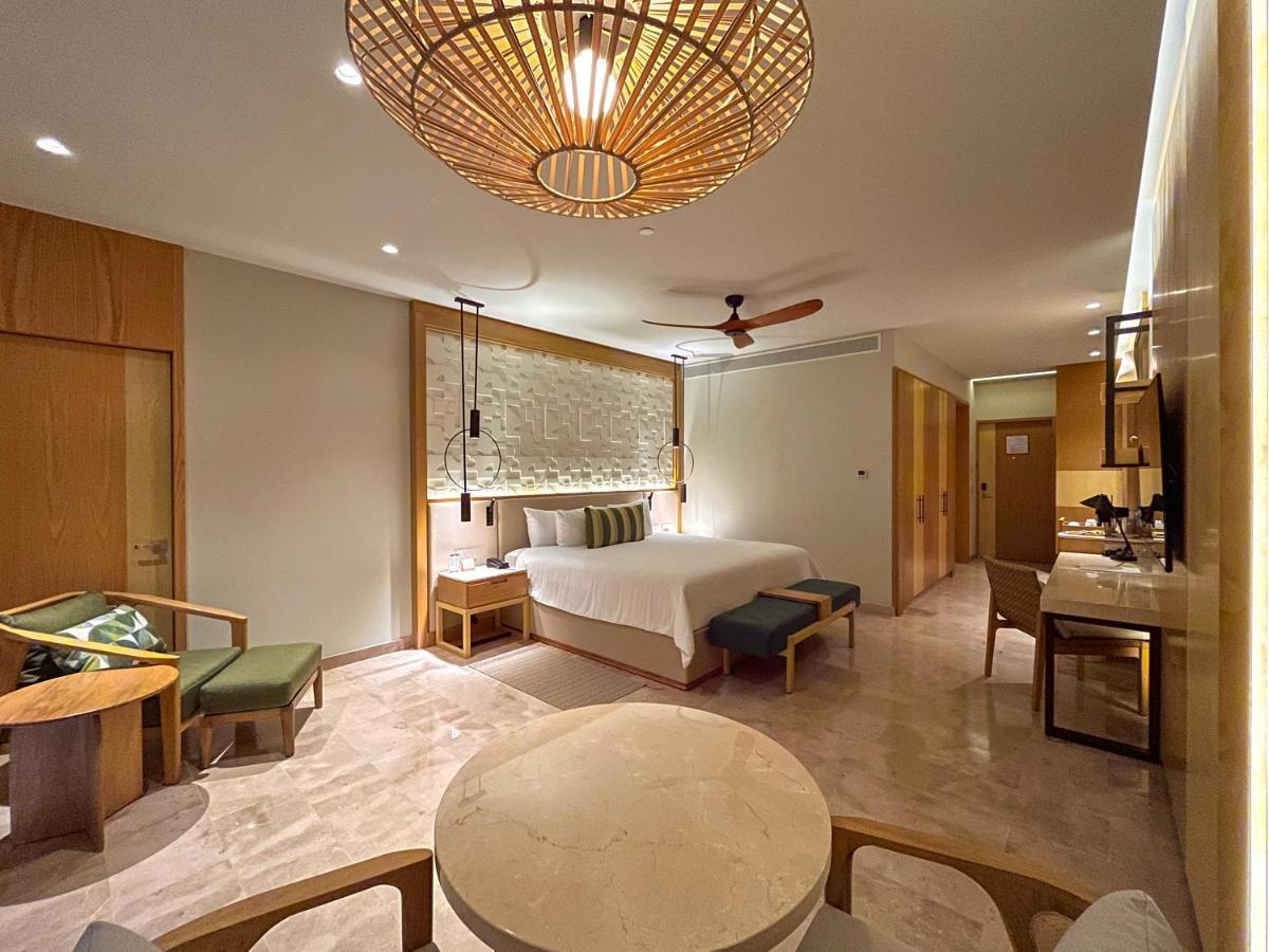 Suite Júnior Serenity Club com Vista Oceano Parcial e Cama King-size
