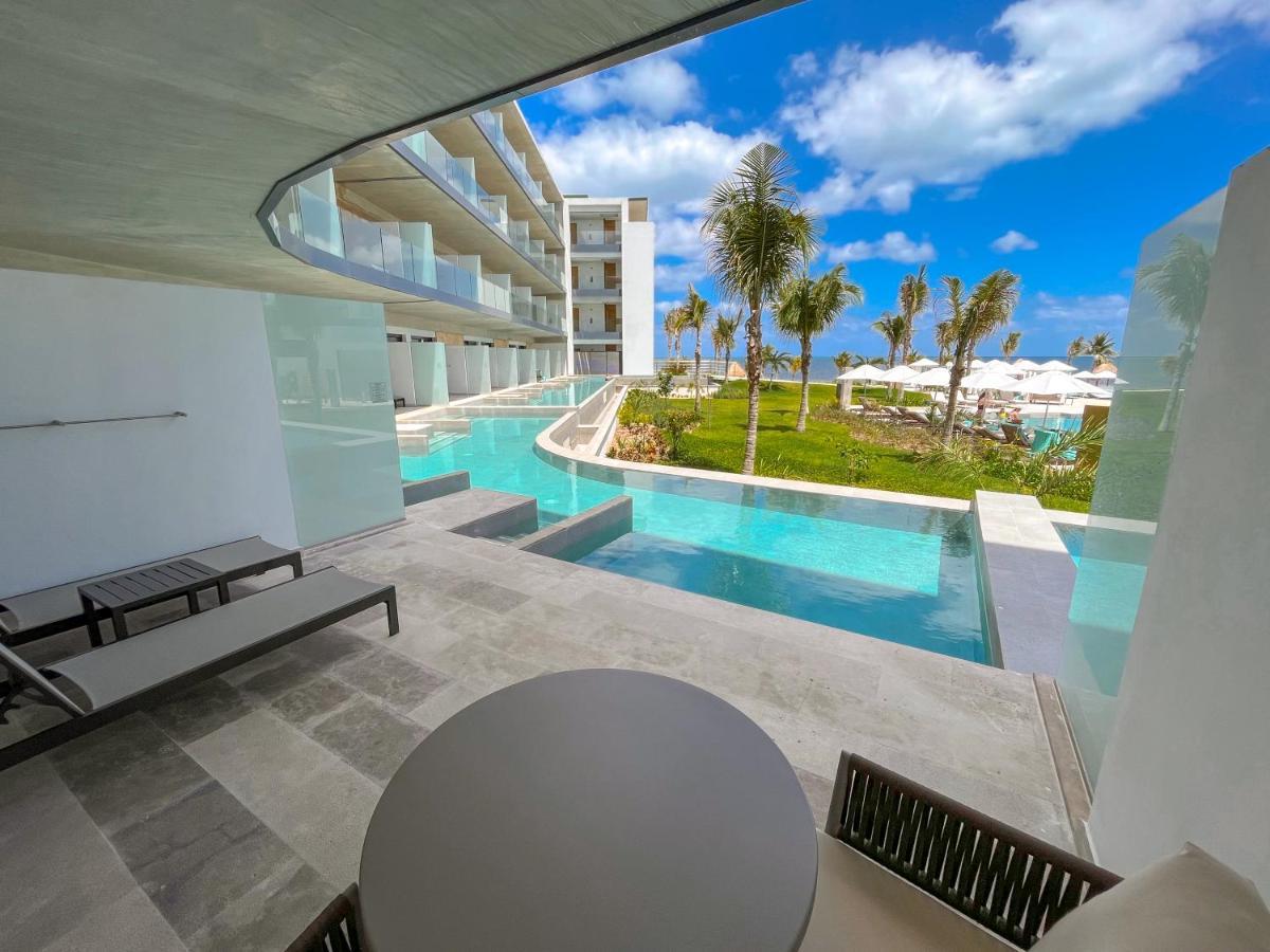 Suite Júnior Serenity com Acesso Direto à Piscina, Vista Oceano Parcial e 2 Camas Queen-size