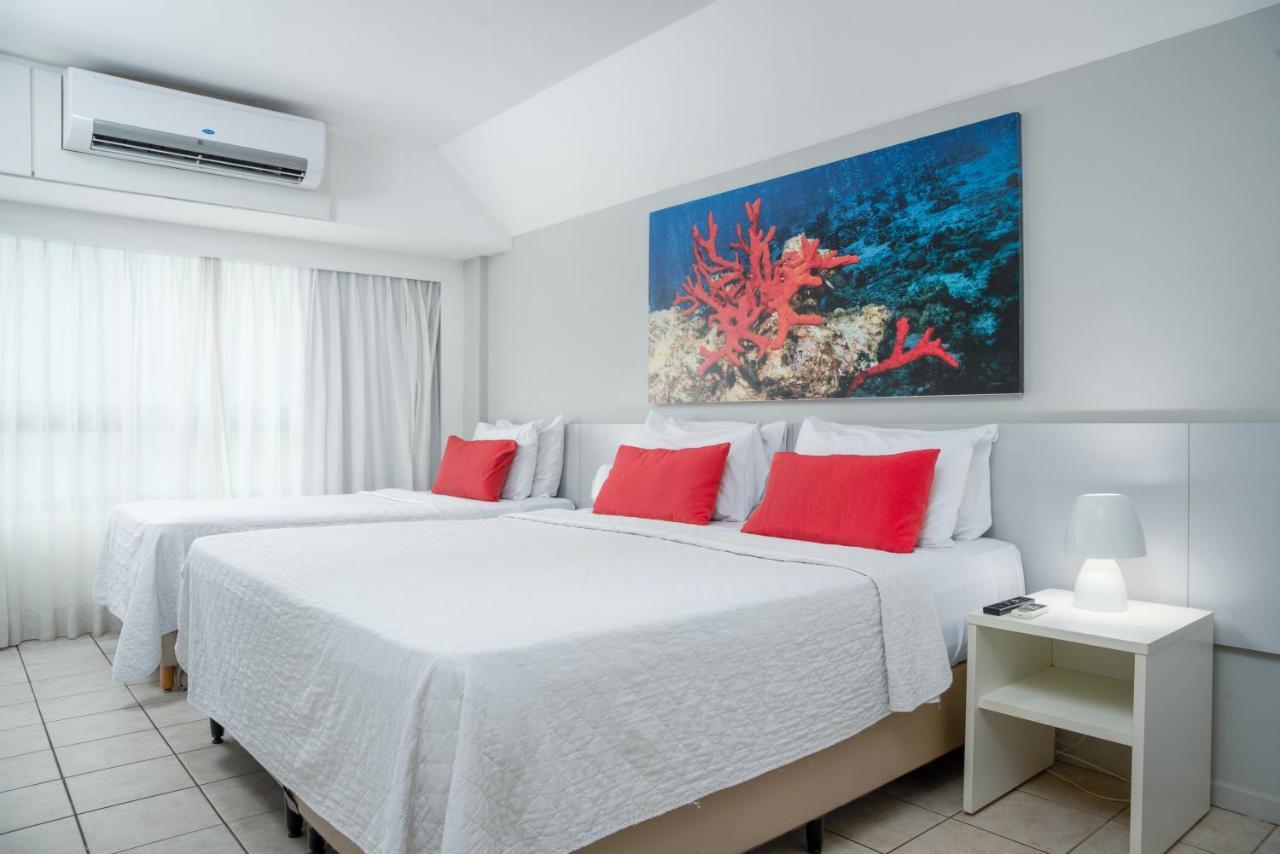 Quarto Triplo com Vista Mar Parcial (3 Adultos + 1 Criança)