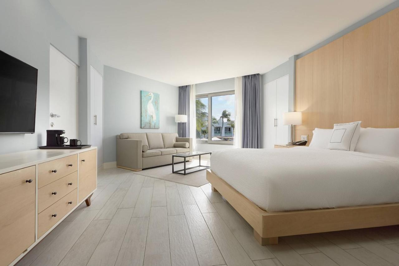 Kamer met Kingsize Bed en een Slaapbank - Uitzicht op de Tuin
