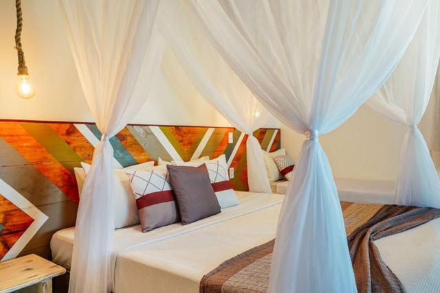 Quarto Quádruplo Deluxe 4th Beach