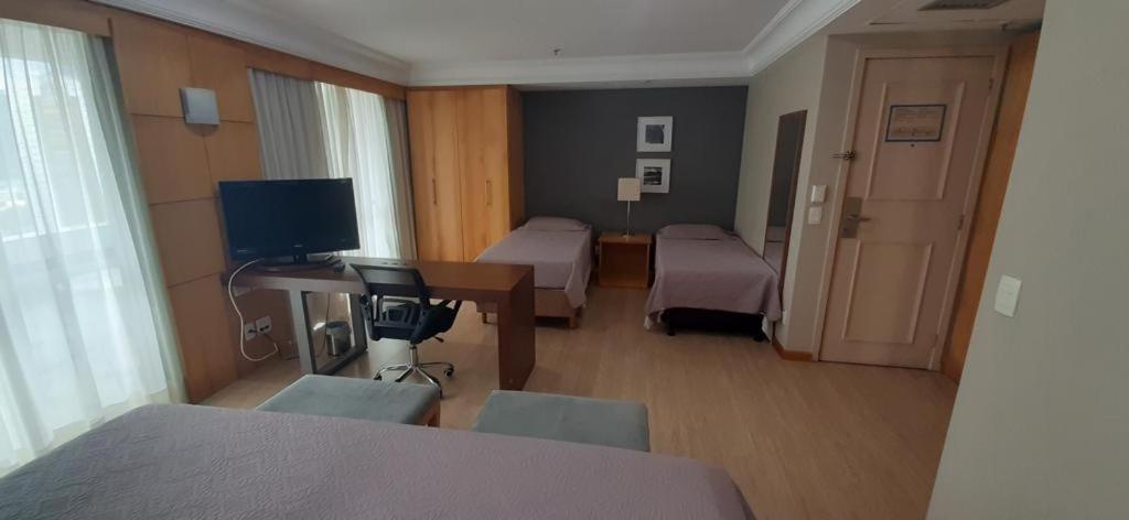 Quarto Quádruplo Luxo