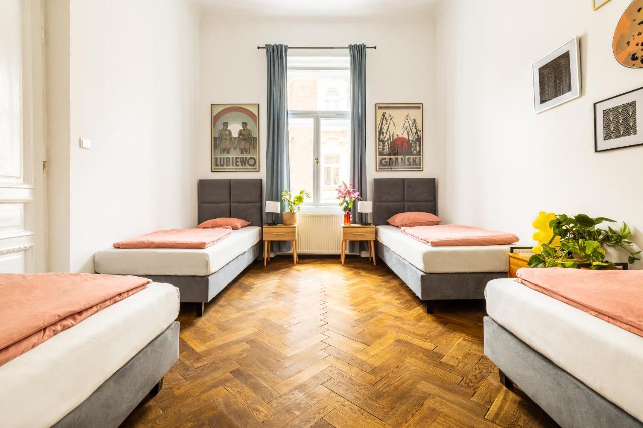 Camera Quadrupla con Bagno in Comune