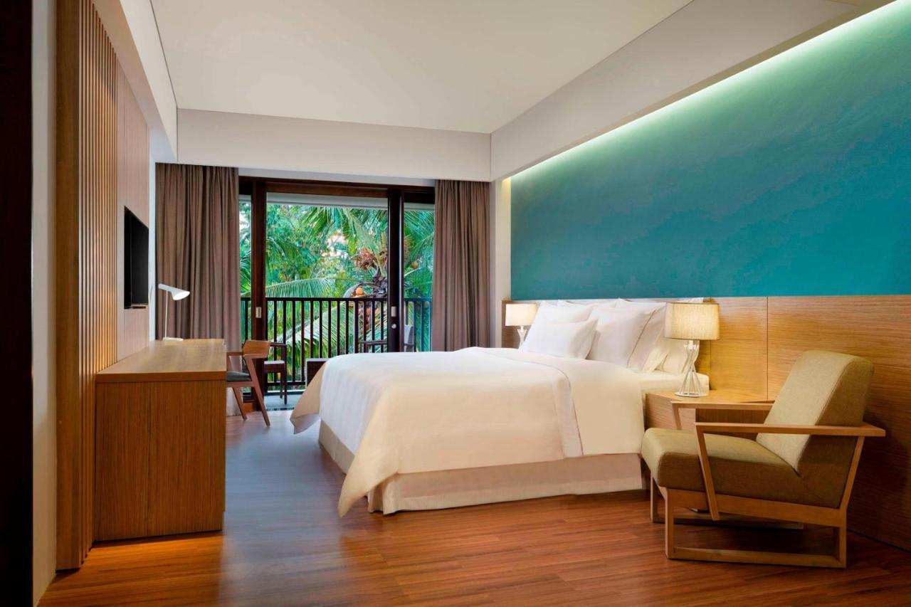 Deluxe Premier King Room with Bathtub and Garden View, Balcony with  Free Mini Bar, Daily Shuttle to Monkey Forest, Daily Yoga, Free Bike to borrow,  Free Family Activity and 24 Hour access to Motion Fitness Center