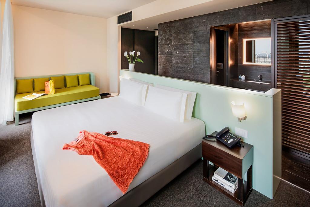 Chambre Triple Deluxe avec Balcon et Vue