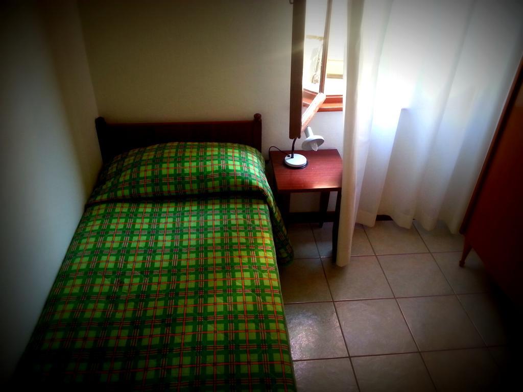 Camera Singola con Bagno in Comune