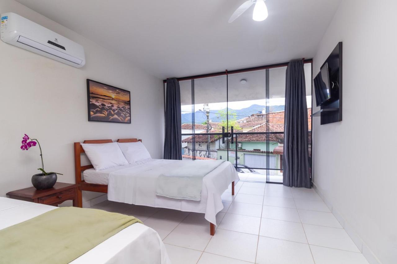 Quarto Triplo com Varanda