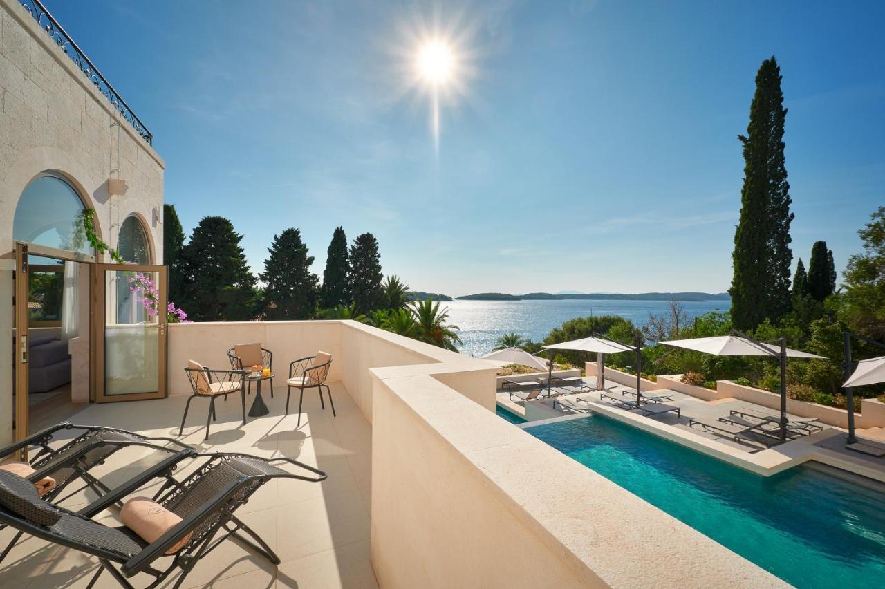 Executive Suite - Uitzicht op zee en het zwembad, met terras - Begane grond
