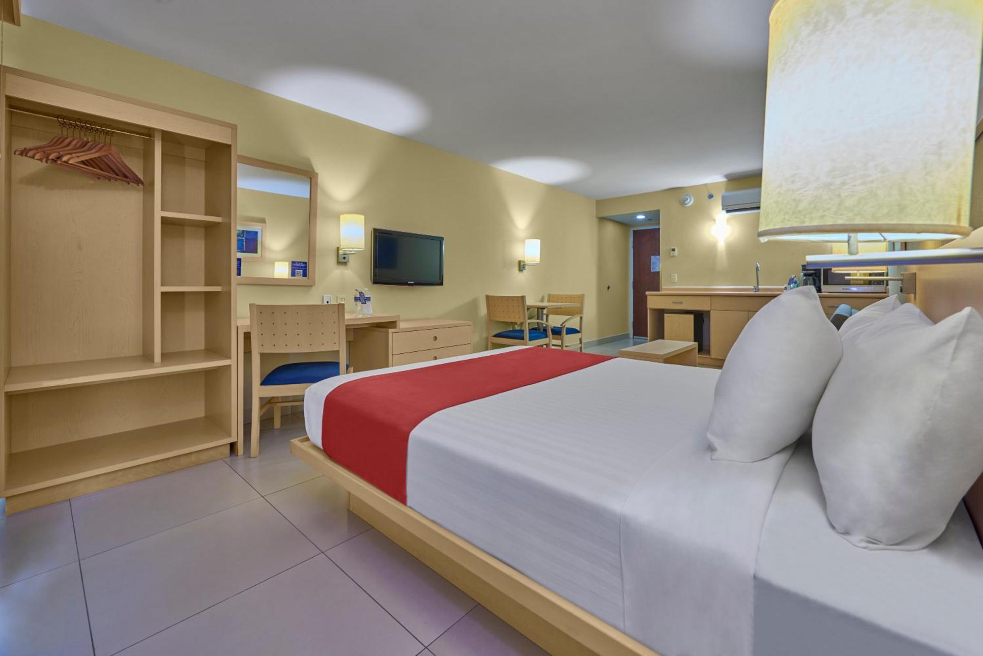 Suíte com Cama Queen-size e Sofá-cama