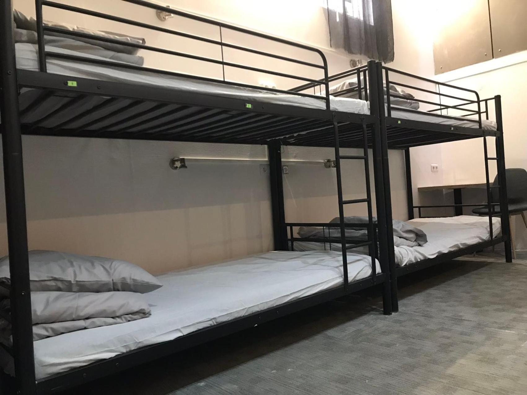 Cama en habitación compartida mixta de 10 camas