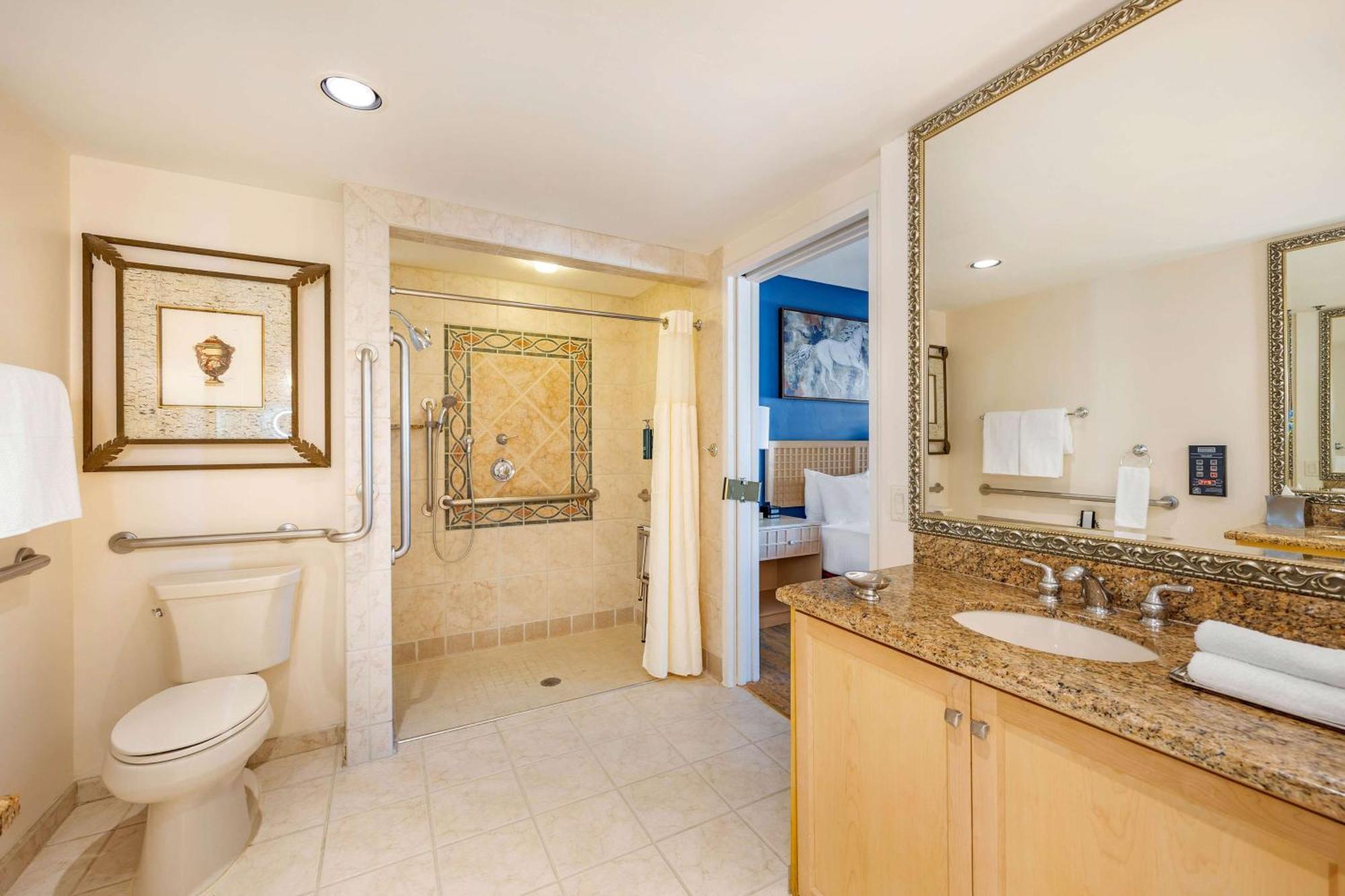 1 BEDROOM 1 KING DELUXE SUITE ROLL SHOWER,1528618867:JPEG