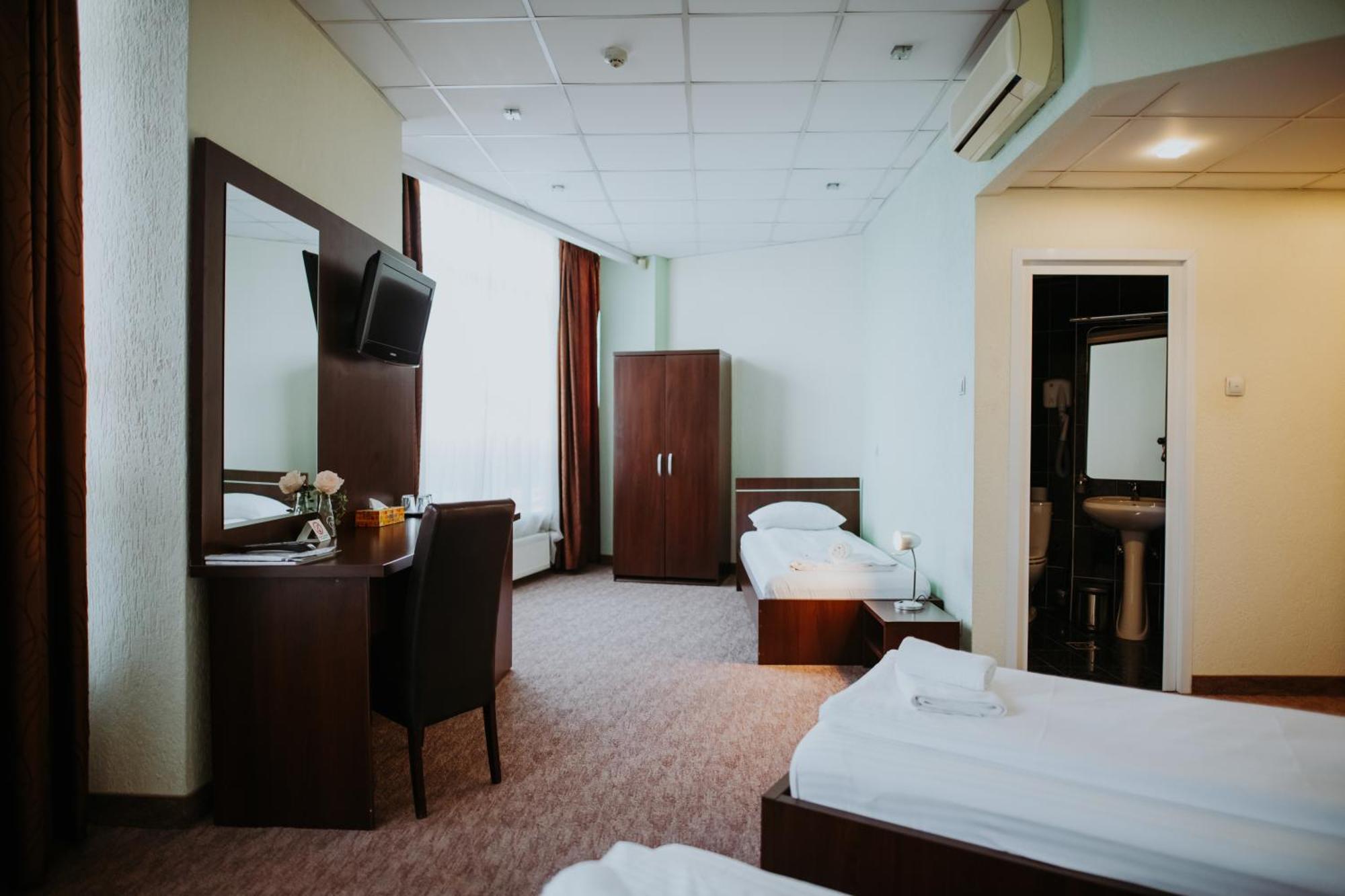Dreibettzimmer