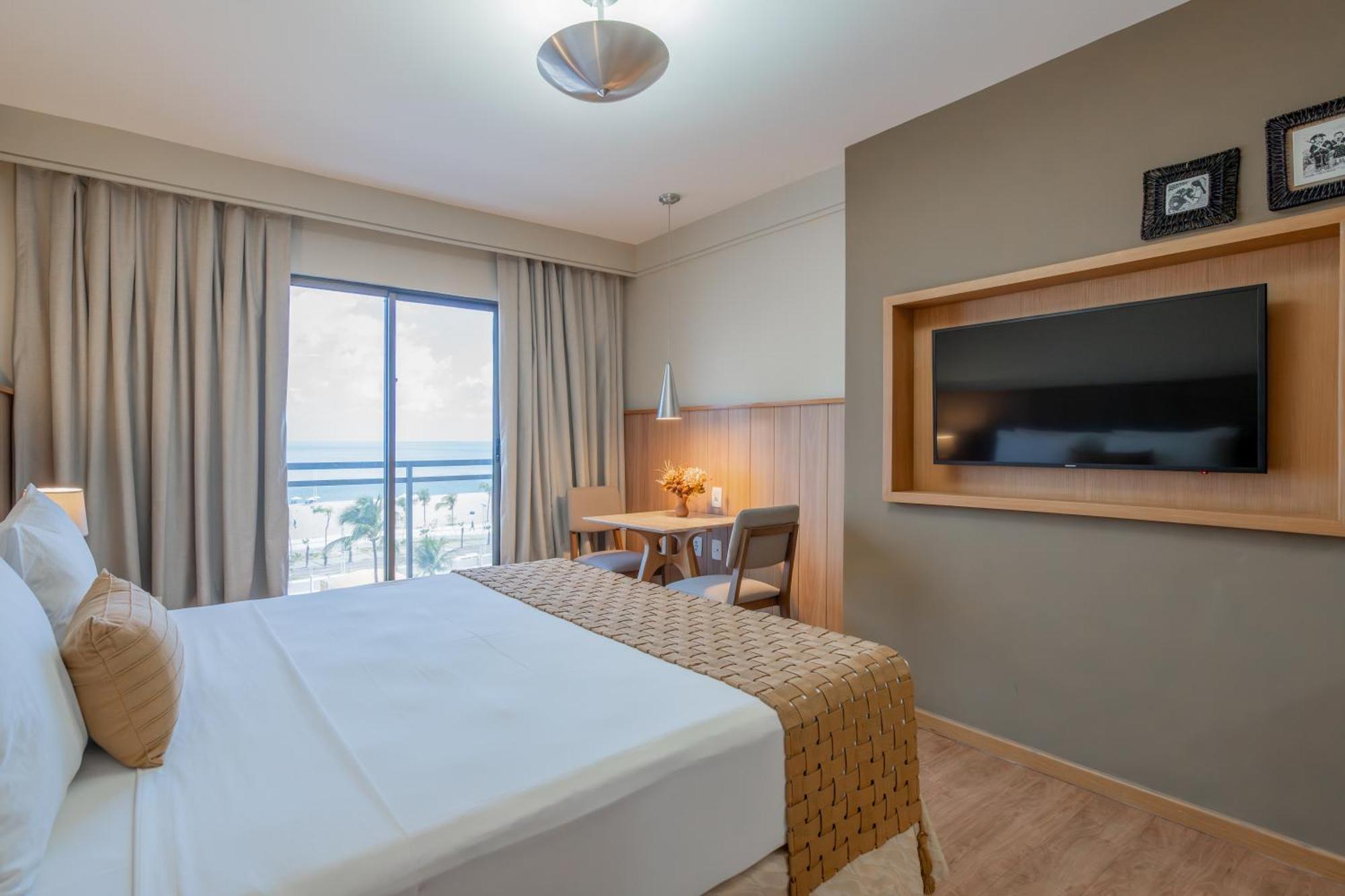Quarto com Vista Piscina