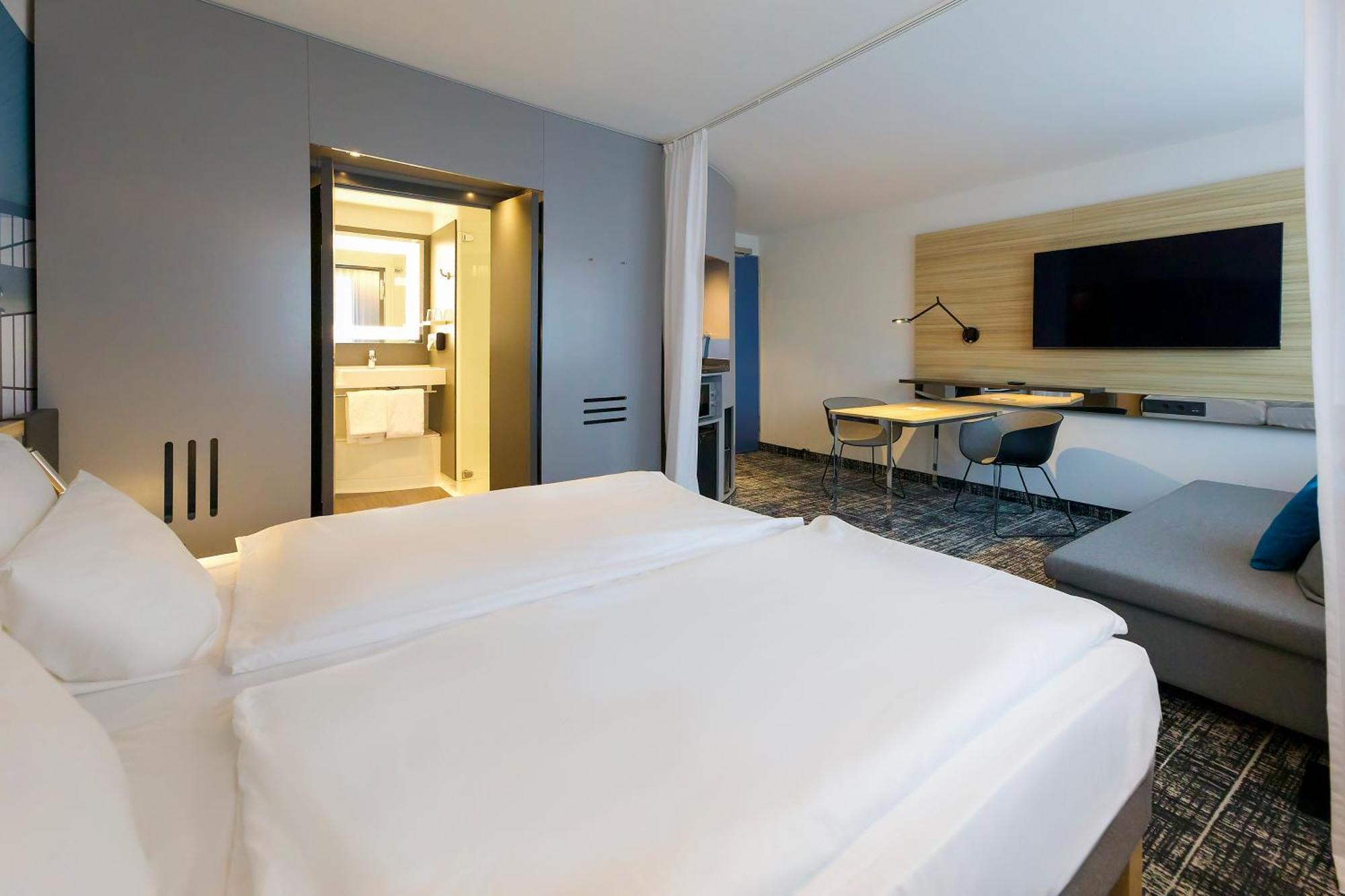 Suite Standard com 2 Camas Individuais e Sofá-cama