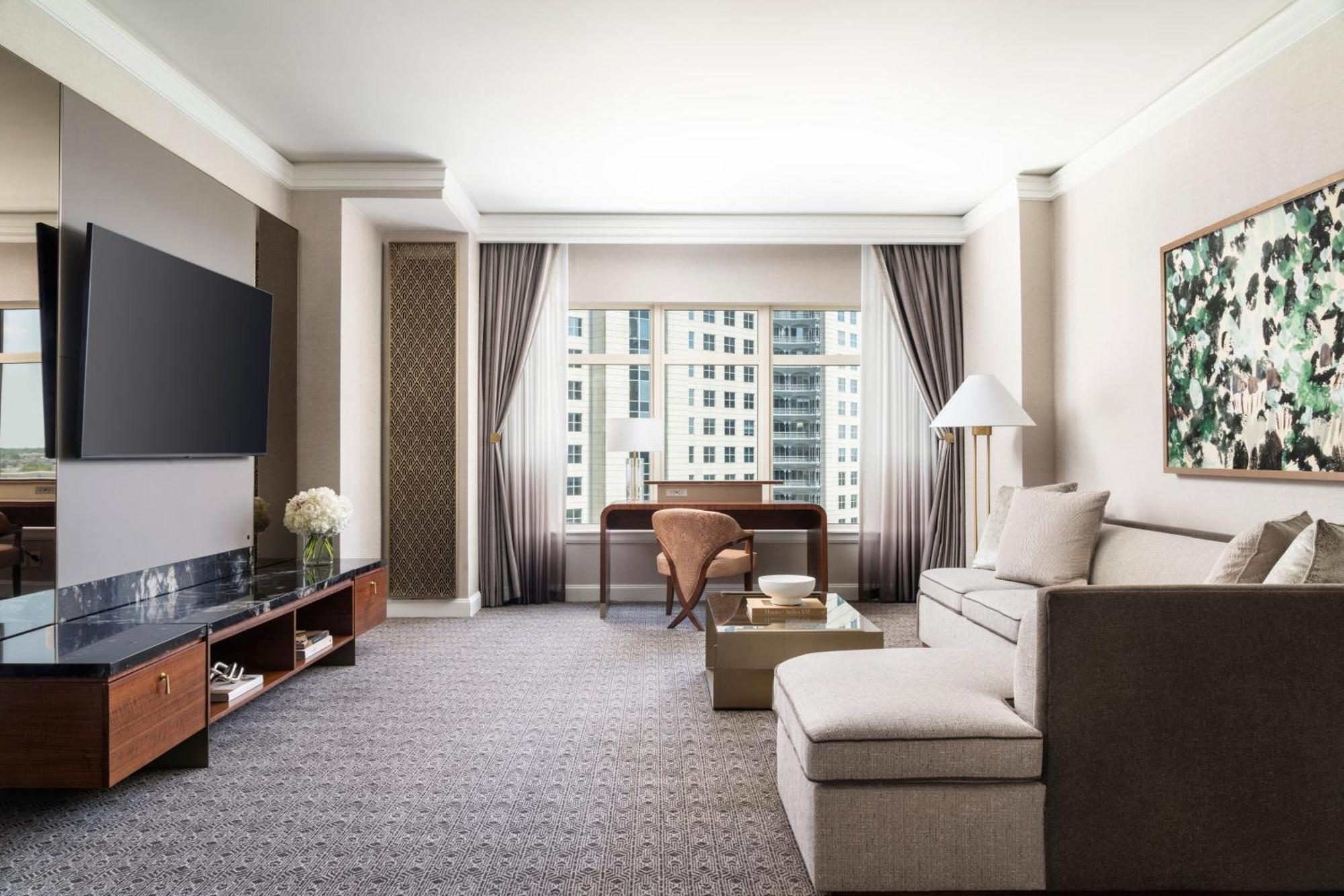 Suite Deluxe con cama extragrande y sofá cama