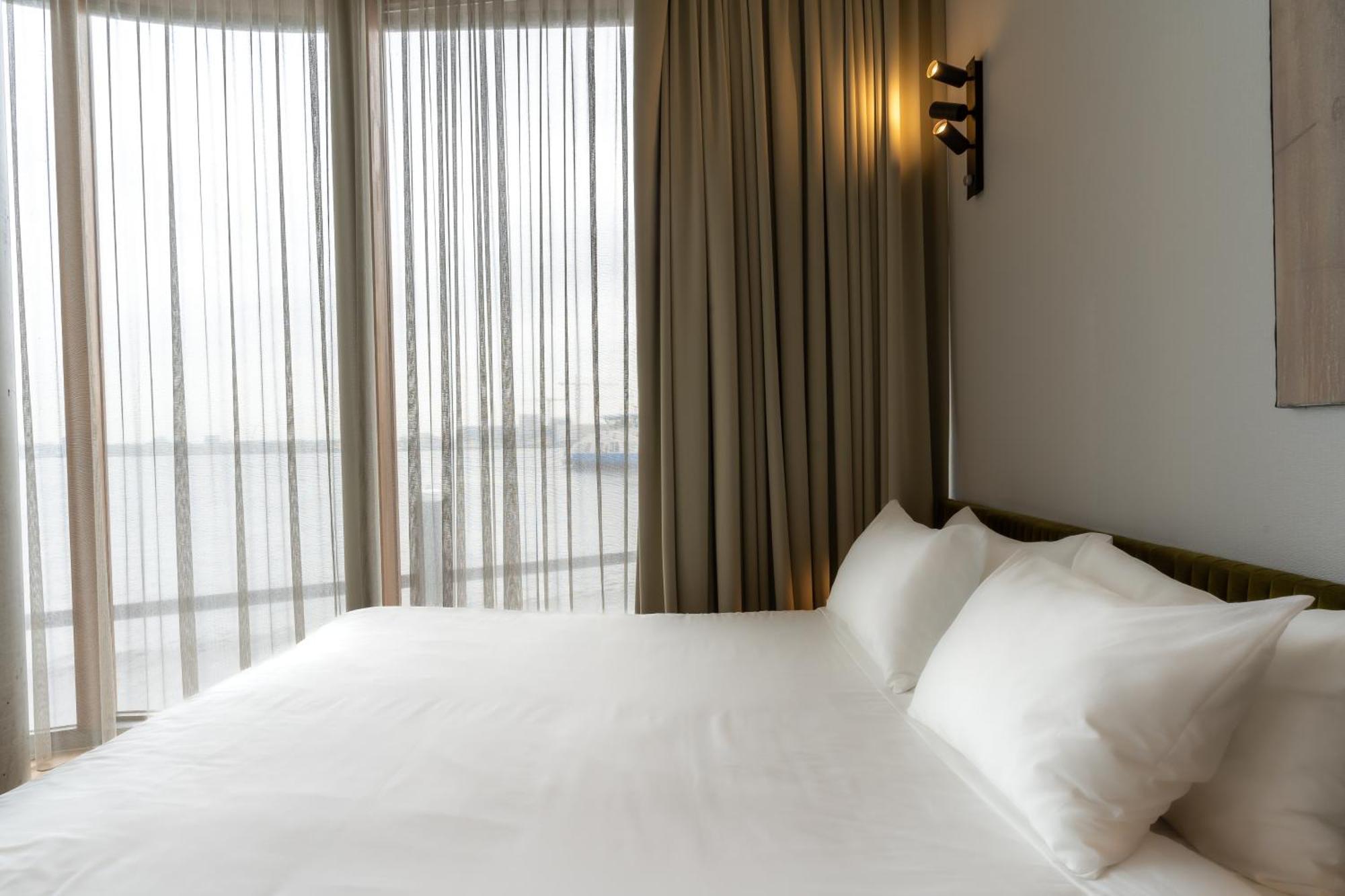 Junior Suite mit Doppel- oder Zweibettzimmer - Flussblick