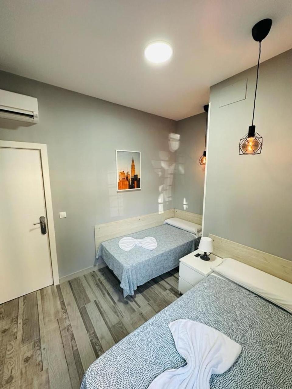 Habitación Doble con baño compartido - 2 camas