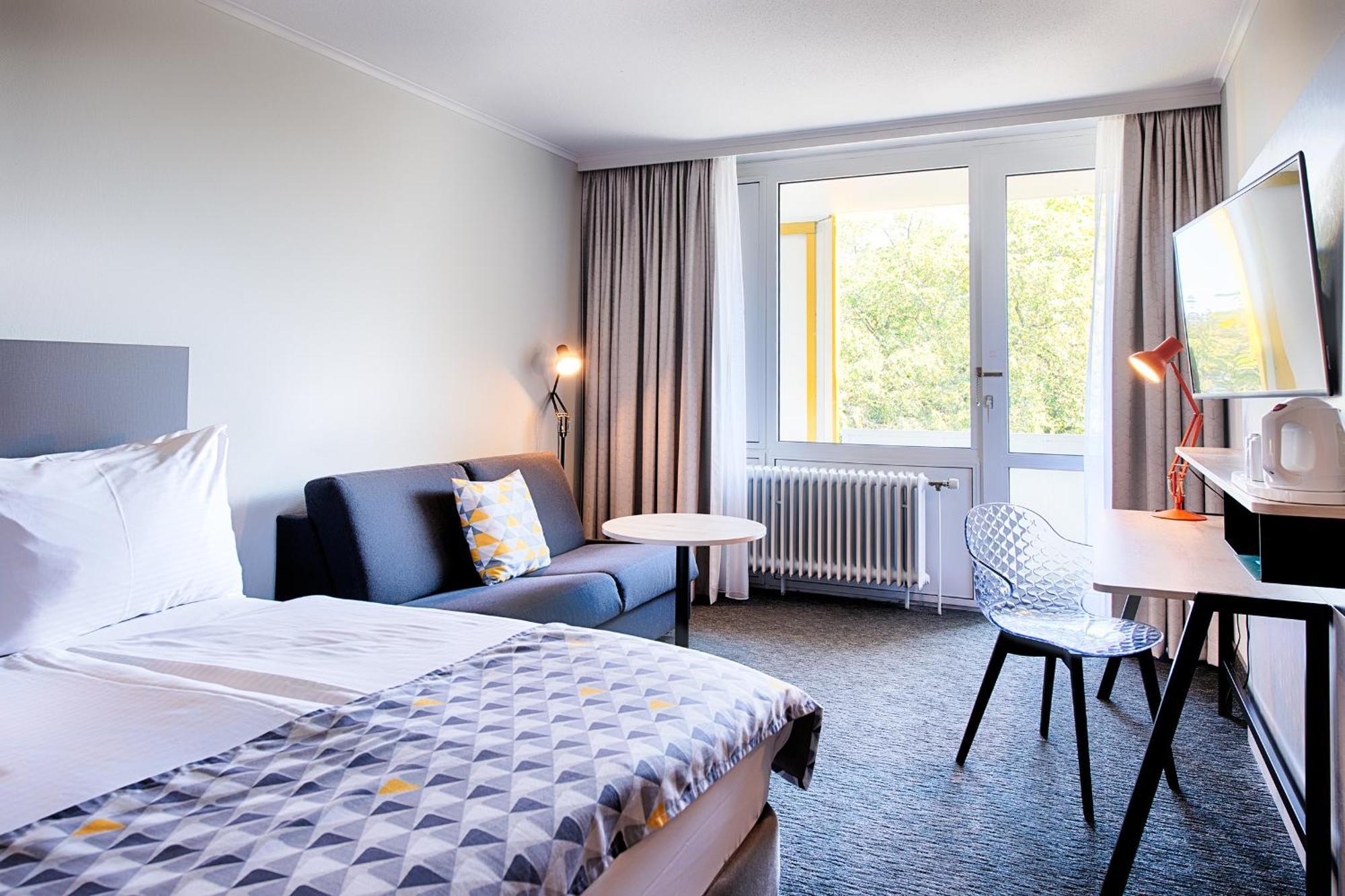 Standard Zimmer mit Queensize-Bett, Schlafsofa und Balkon