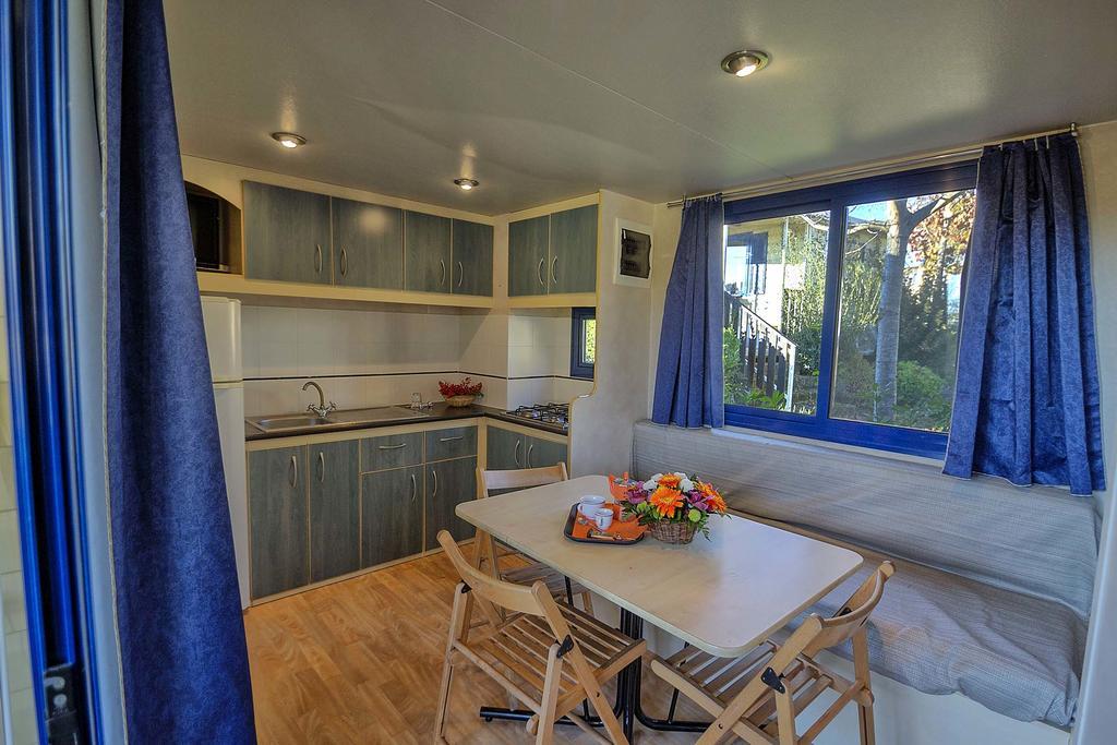 Budget Two-Bedroom Bungalow Kitchenette Patio,165907413:JPEG