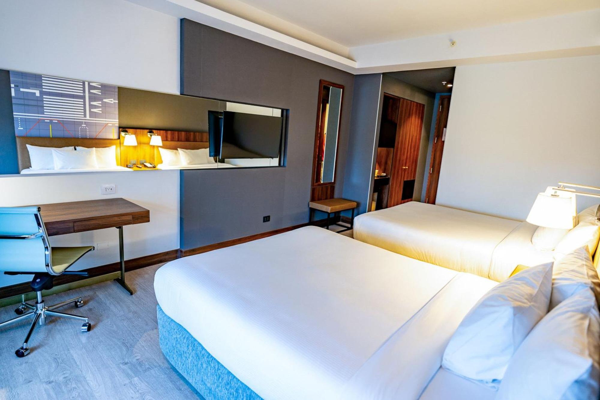 Quarto Duplo com 2 Camas de Casal